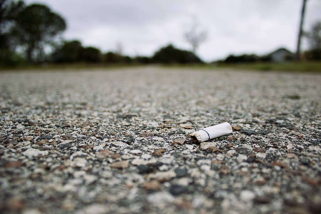 Cigarette butt left behind on road